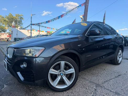 Used 2016 BMW X4 xDrive28i AWD/4WD image 1