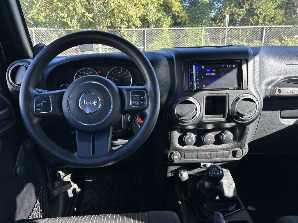 Used 2011 Jeep Wrangler Unlimited Sport w/ Trailer Tow Group AWD/4WD image 16