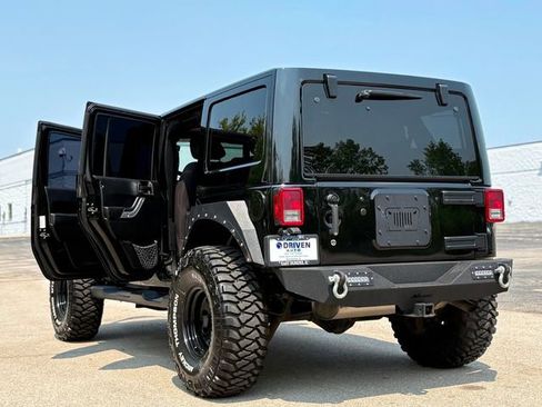 Used 2013 Jeep Wrangler Unlimited Sahara w/ Dual Top Group image 25