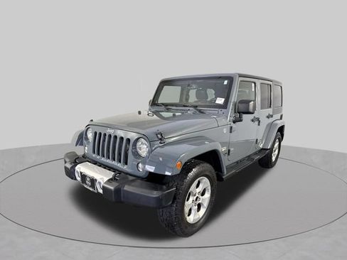 Used 2014 Jeep Wrangler Unlimited Sahara w/ Dual Top Group AWD/4WD image 22