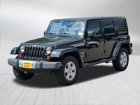 Used 2012 Jeep Wrangler Unlimited Sahara w/ Dual Top Group AWD/4WD image 3