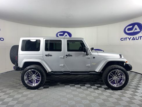 Used 2012 Jeep Wrangler Unlimited Sahara w/ Trailer Tow Group AWD/4WD image 2