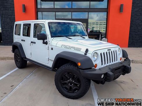 Used 2013 Jeep Wrangler Unlimited Sahara image 1