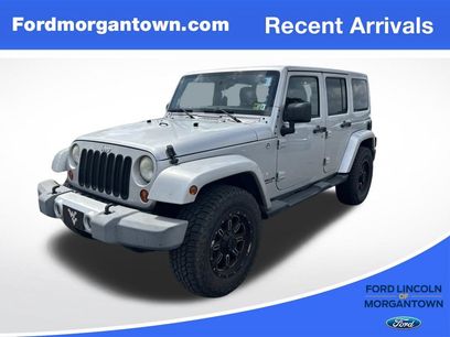 Used 2012 Jeep Wrangler Unlimited Sahara w/ Dual Top Group