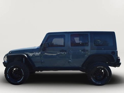 Used 2014 Jeep Wrangler Unlimited Rubicon w/ Dual Top Group AWD/4WD image 6