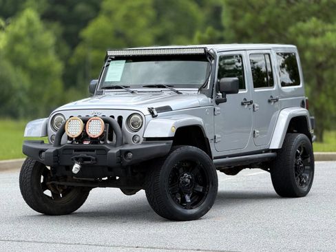 Used 2014 Jeep Wrangler Unlimited Rubicon w/ Dual Top Group AWD/4WD image 8