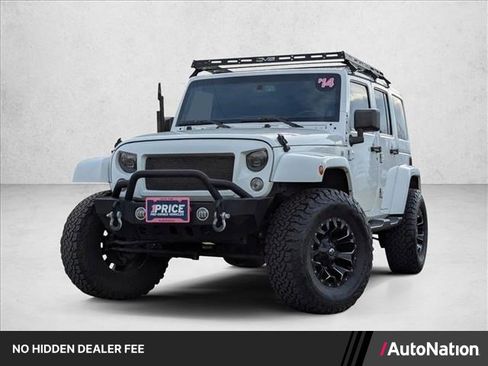 Used 2014 Jeep Wrangler Unlimited Sahara w/ Max Tow Package AWD/4WD image 1