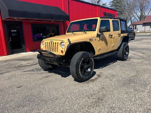 Used 2013 Jeep Wrangler Unlimited Sport w/ Mopar Black Appearance Group image 2