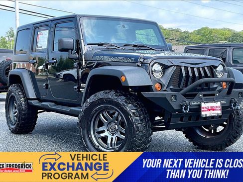Used 2013 Jeep Wrangler Unlimited Sport AWD/4WD image 1