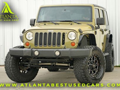Used 2013 Jeep Wrangler Unlimited Sport w/ Mopar Black Appearance Group