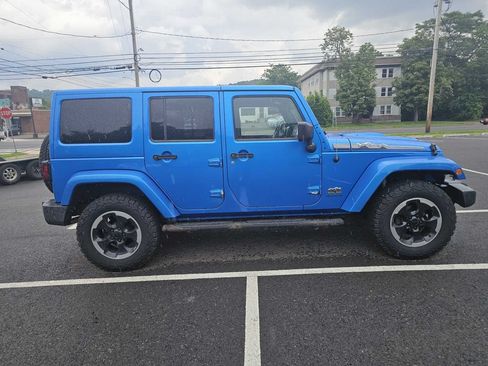 Used 2014 Jeep Wrangler Unlimited Sahara AWD/4WD image 4