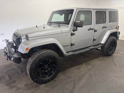 Used 2015 Jeep Wrangler Unlimited Sahara w/ Dual Top Group