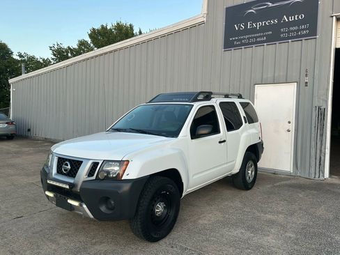 Used 2014 Nissan Xterra X image 1