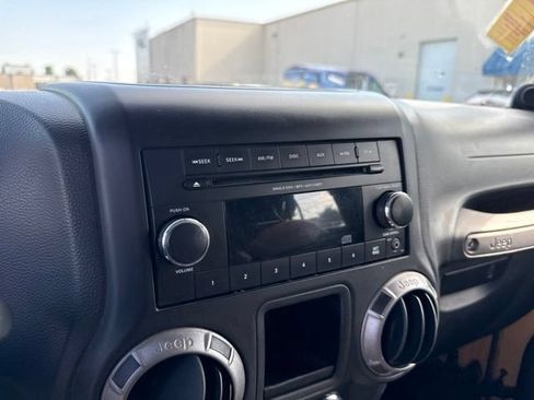 Used 2013 Jeep Wrangler Unlimited Sport w/ Mopar Black Appearance Group AWD/4WD image 22