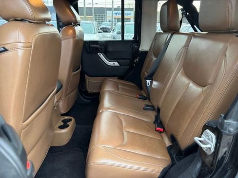 Used 2013 Jeep Wrangler Unlimited Sahara w/ Dual Top Group image 25