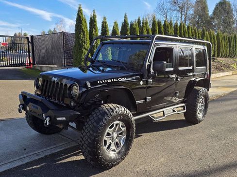 Used 2014 Jeep Wrangler Unlimited Rubicon w/ Connectivity Group AWD/4WD image 1
