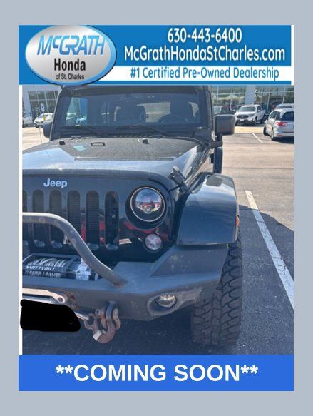 Used 2015 Jeep Wrangler Unlimited Sahara w/ Connectivity Group AWD/4WD image 1