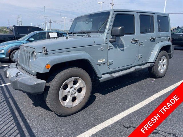 Used 2015 Jeep Wrangler Unlimited Sahara AWD/4WD image 1