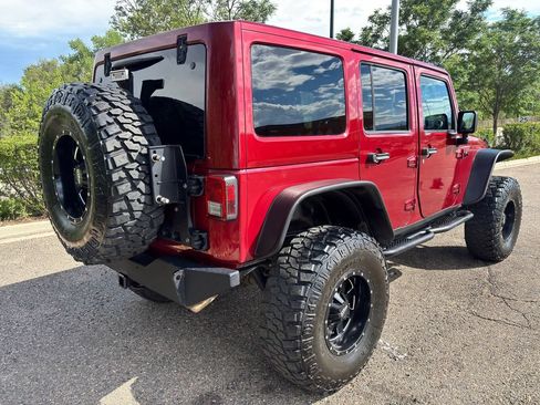 Used 2013 Jeep Wrangler Unlimited Sahara w/ Dual Top Group AWD/4WD image 9