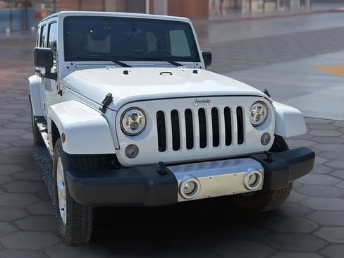 Used 2015 Jeep Wrangler Unlimited Sahara w/ Mopar Chrome Edition Group AWD/4WD image 22