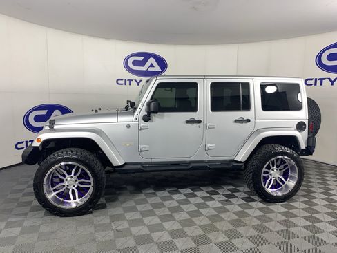 Used 2012 Jeep Wrangler Unlimited Sahara w/ Trailer Tow Group AWD/4WD image 6