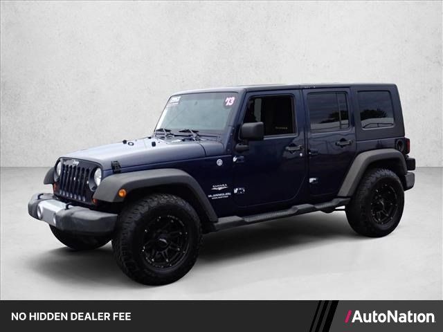 Used 2013 Jeep Wrangler Unlimited Sahara w/ Connectivity Group AWD/4WD image 1