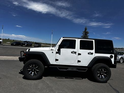 Used 2013 Jeep Wrangler Unlimited Sport AWD/4WD image 2