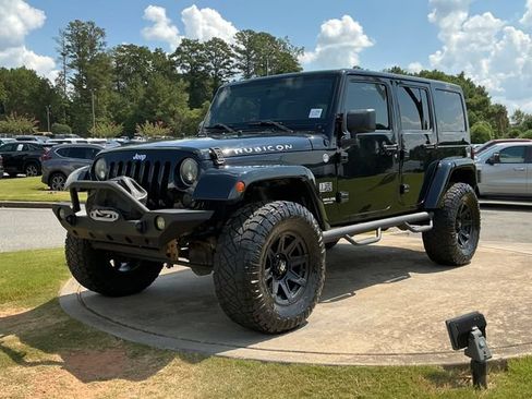 Used 2012 Jeep Wrangler Unlimited Rubicon w/ Dual Top Group AWD/4WD image 3