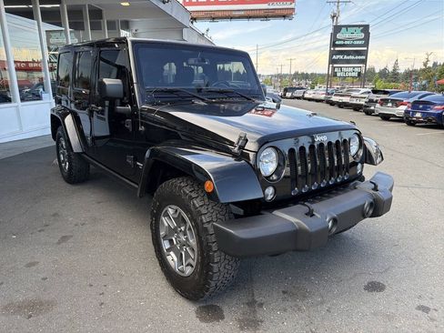Used 2015 Jeep Wrangler Unlimited Rubicon w/ Dual Top Group AWD/4WD image 11