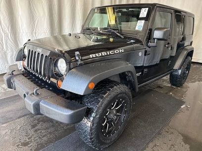 Used 2011 Jeep Wrangler Unlimited Rubicon w/ Dual Top Group