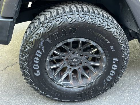 Used 2014 Jeep Wrangler Unlimited Sahara w/ Dual Top Group AWD/4WD image 39