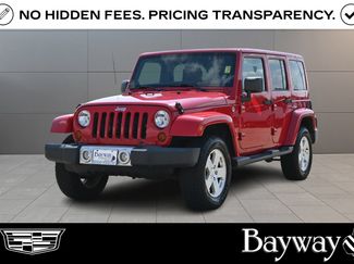 Used 2012 Jeep Wrangler Unlimited Sahara w/ Dual Top Group AWD/4WD video 1