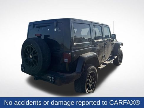 Used 2012 Jeep Wrangler Unlimited Sahara w/ Dual Top Group AWD/4WD image 2