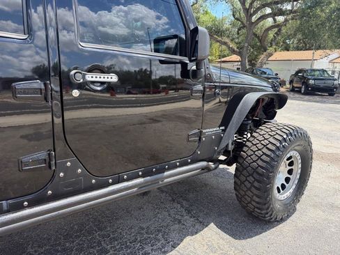 Used 2012 Jeep Wrangler Unlimited Sahara w/ Mopar Chrome Edition Group AWD/4WD image 4