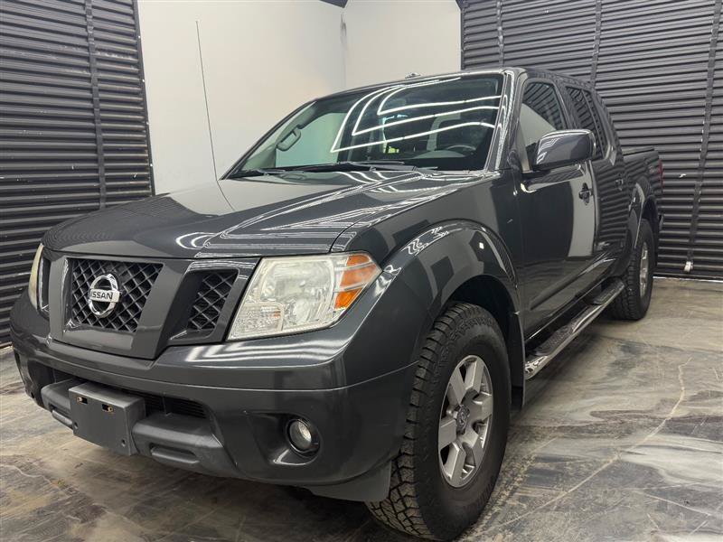 Used 2012 Nissan Frontier PRO-4X AWD/4WD image 1