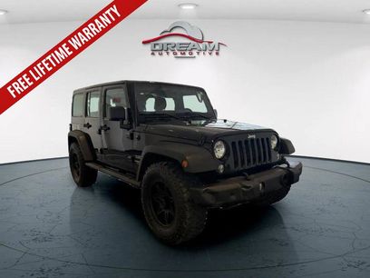 Used 2016 Jeep Wrangler Unlimited Sport w/ Mopar Black Appearance Group