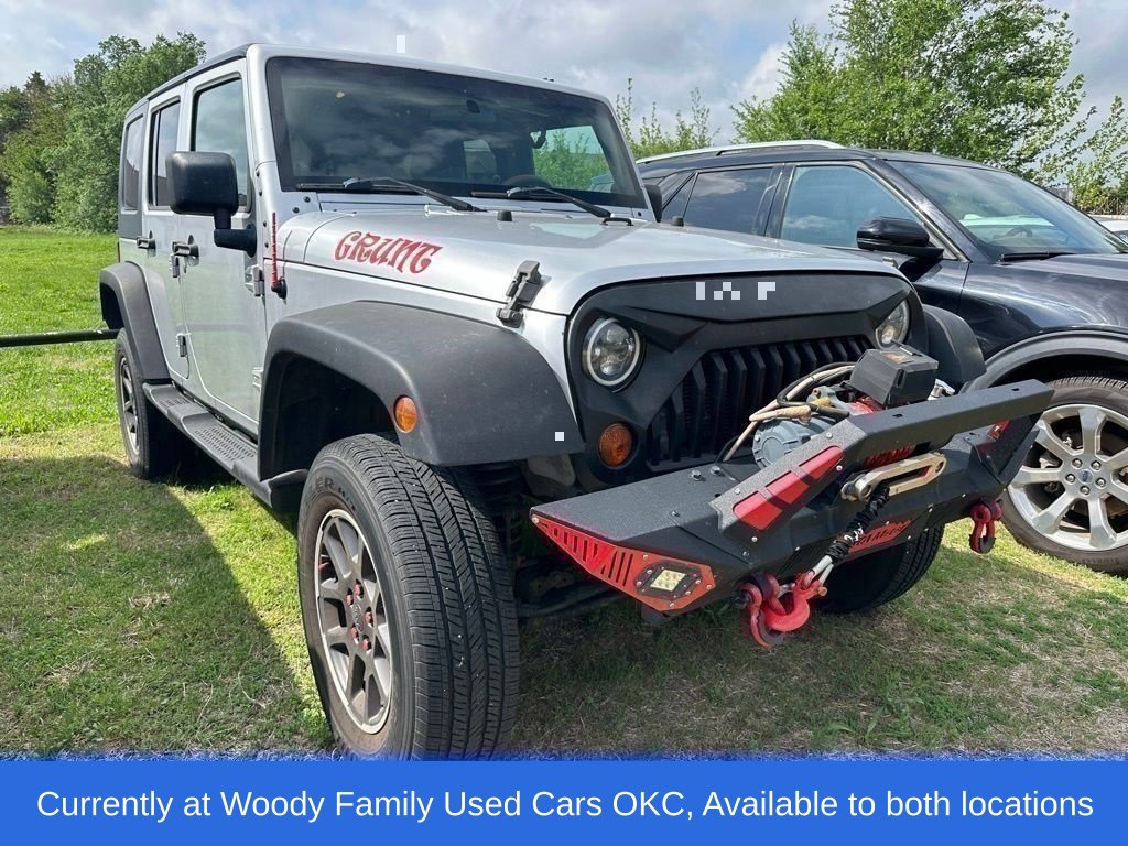 Used 2010 Jeep Wrangler Unlimited Sport AWD/4WD image 1