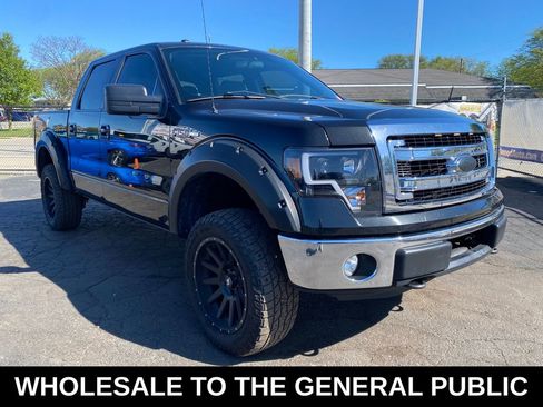 Used 2014 Ford F150 XLT AWD/4WD image 1
