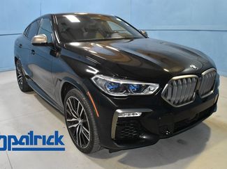 Used 2021 BMW X6 M50i w/ Executive Package AWD/4WD video 1