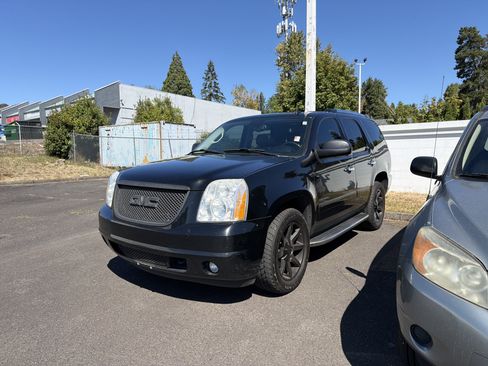 Used 2011 GMC Yukon Denali AWD/4WD image 1