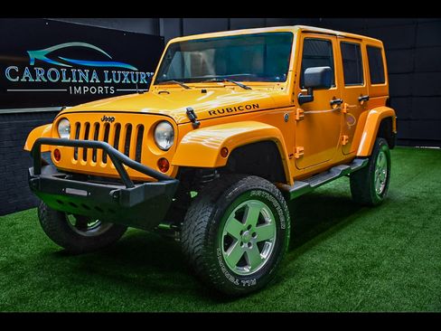 Used 2012 Jeep Wrangler Unlimited Rubicon w/ Max Tow Pkg image 1