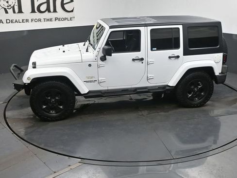 Used 2013 Jeep Wrangler Unlimited Sahara w/ Dual Top Group AWD/4WD image 57