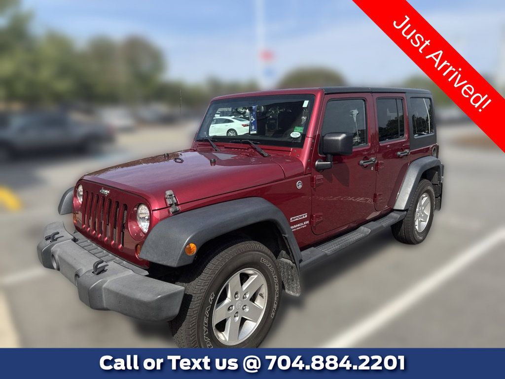 Used 2013 Jeep Wrangler Unlimited Sport AWD/4WD image 1