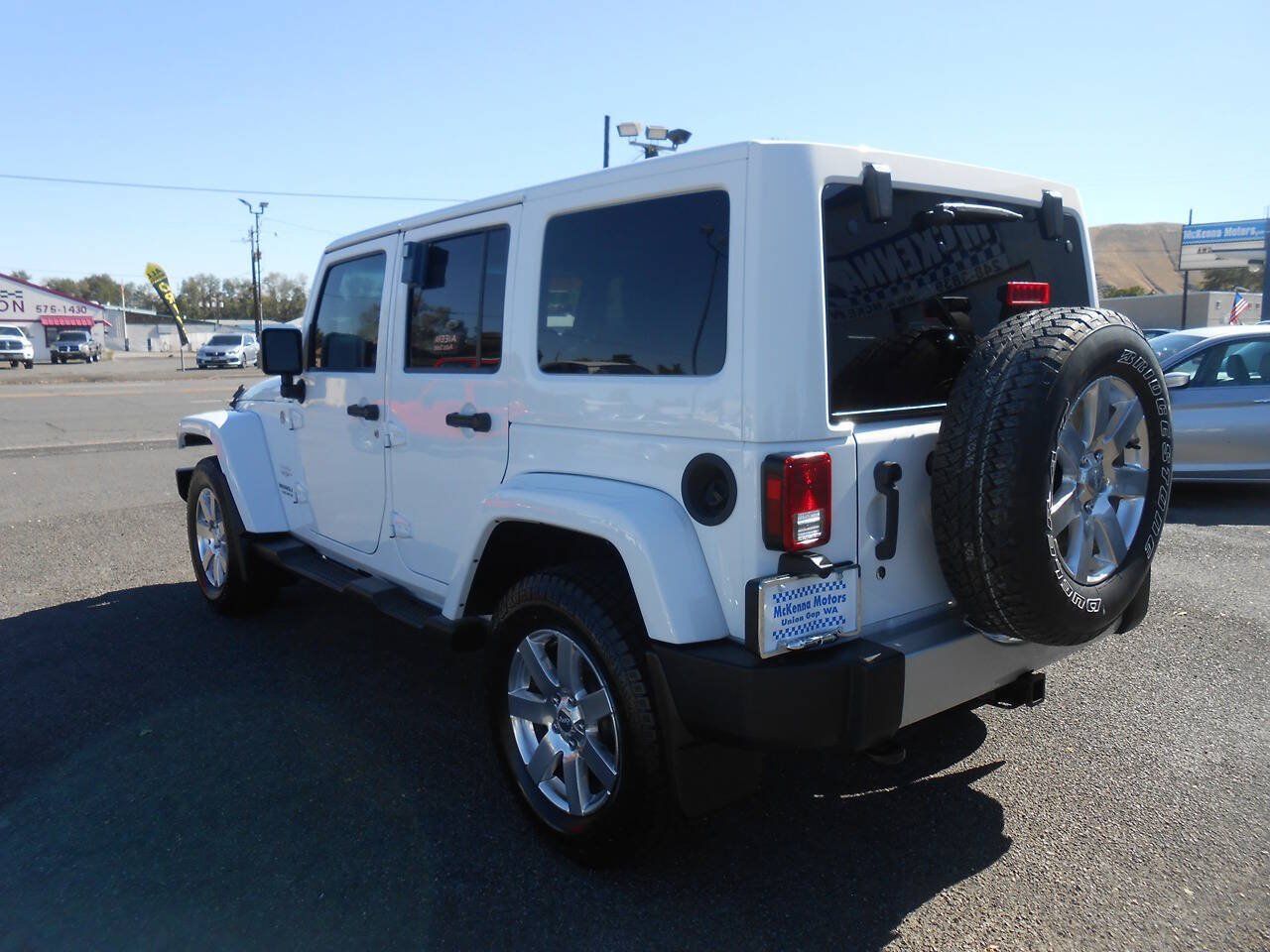 Used 2012 Jeep Wrangler Unlimited Sahara w/ Dual Top Group AWD/4WD image 7