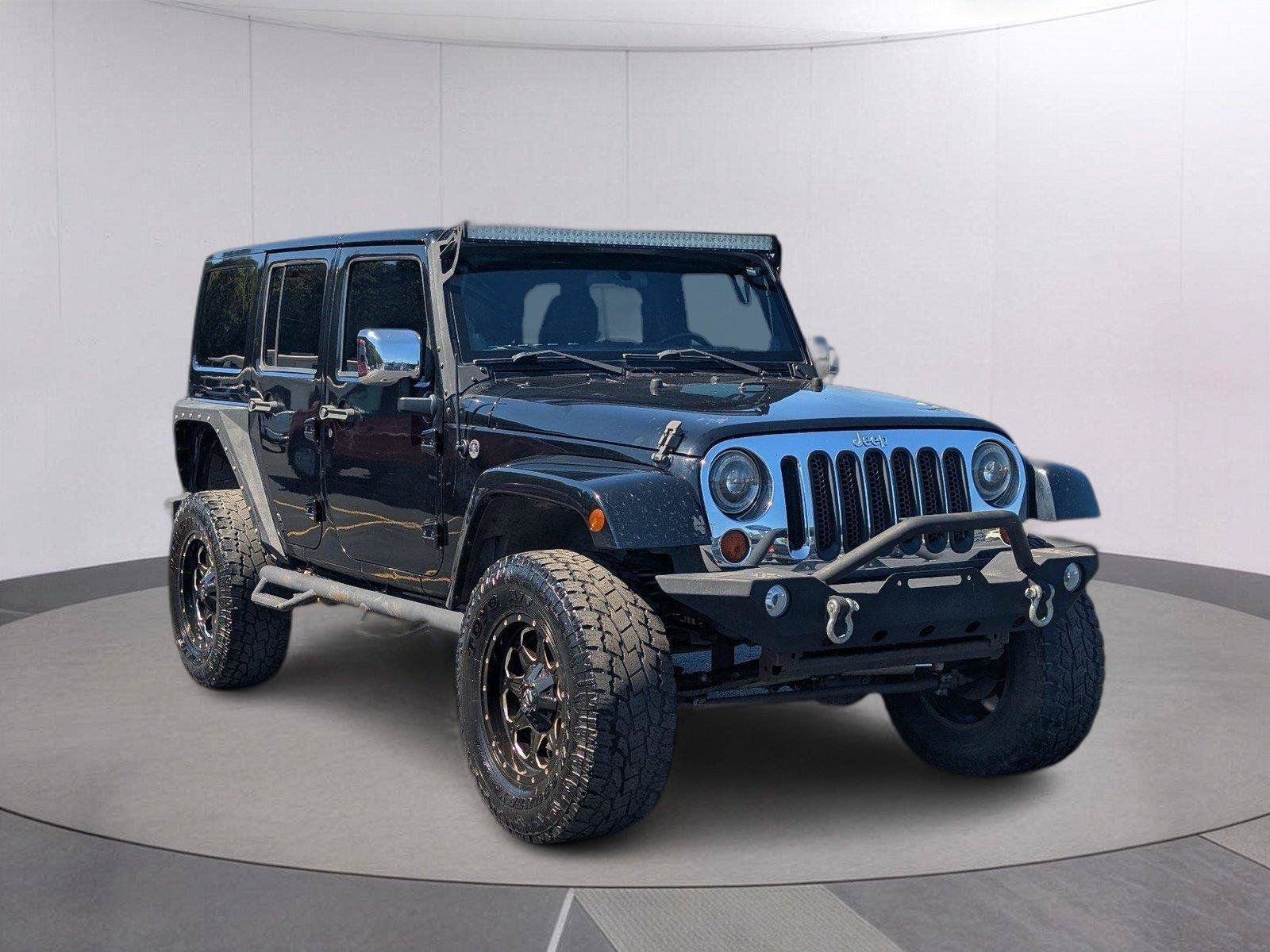 Used 2012 Jeep Wrangler Unlimited Sahara AWD/4WD image 7