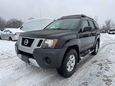 Used 2013 Nissan Xterra 4WD image 1