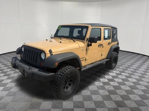 Used 2013 Jeep Wrangler Unlimited Sport w/ Mopar Black Appearance Group AWD/4WD image 13