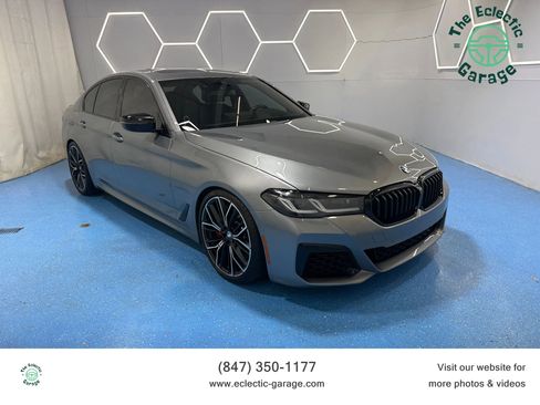 Used 2023 BMW M550i xDrive w/ Premium Enhanced Package image 1