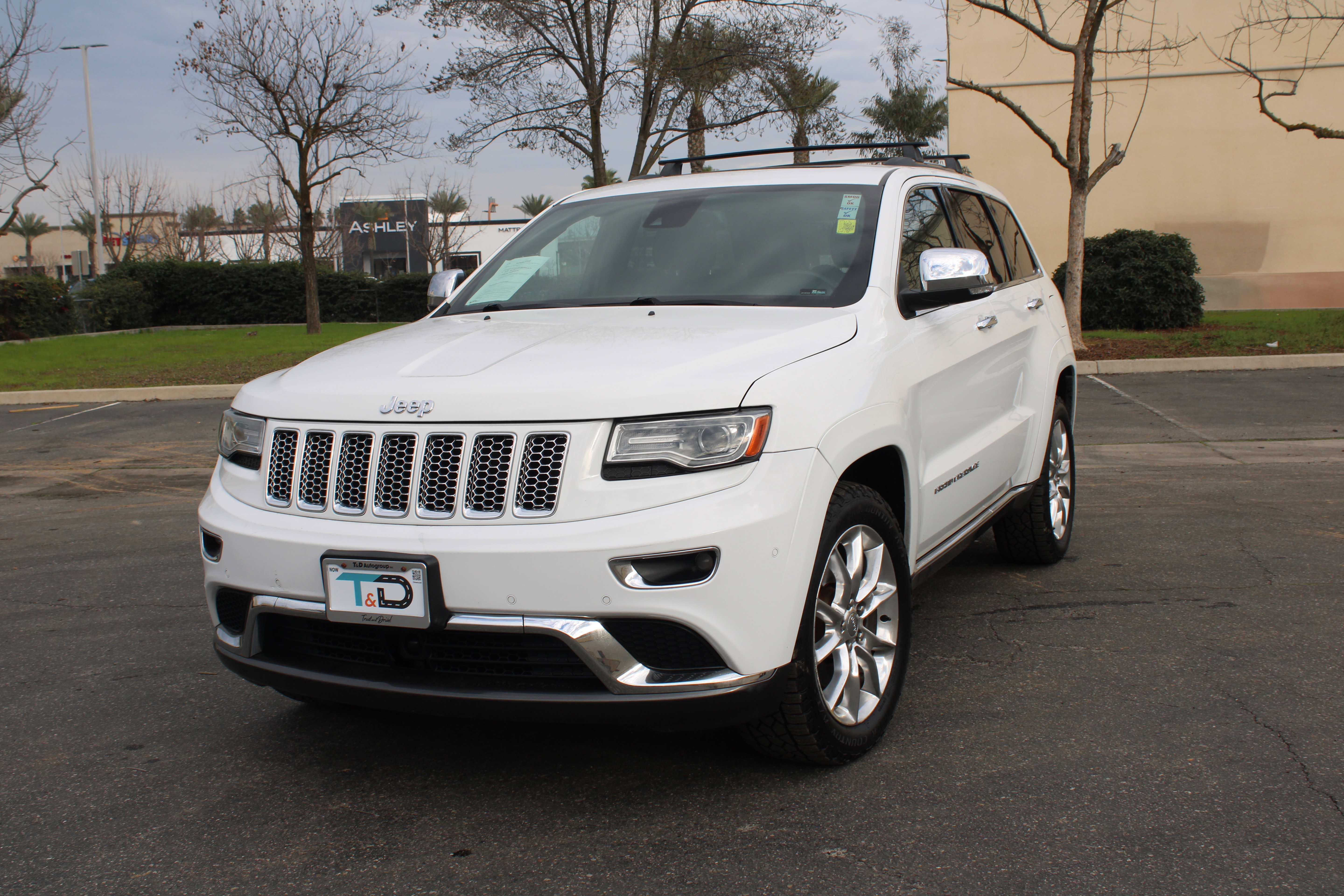 Used 2014 Jeep Grand Cherokee Summit AWD/4WD image 1