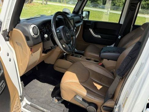 Used 2013 Jeep Wrangler Unlimited Sahara w/ Dual Top Group AWD/4WD image 29